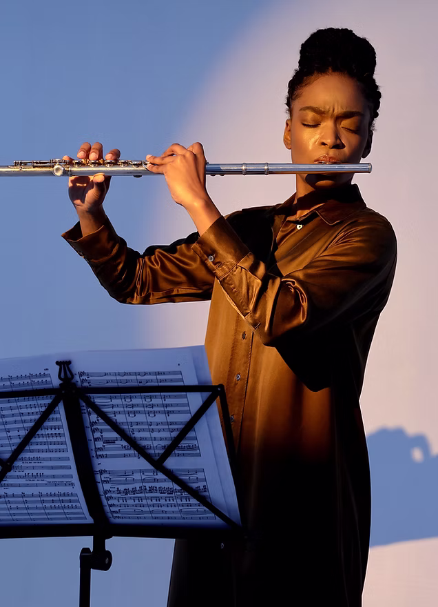 Flutist performing - Follow Adventures in Syncopation